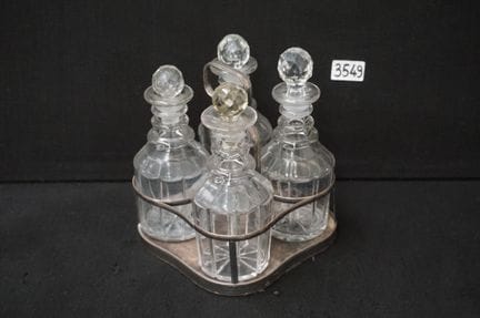 4 carafes in a silver-plated holder