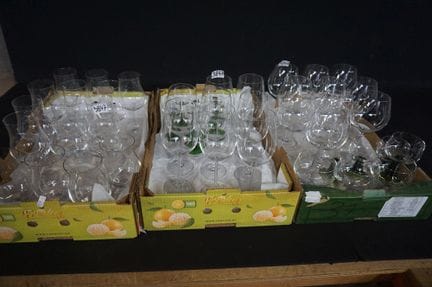 large assortment of various glasses—mostly crystal