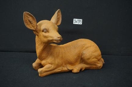 cast iron sculpture - "reclining deer" - L: 31 cm