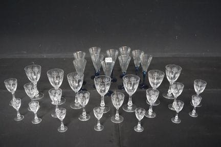 a collection of crystal and glass pieces—including