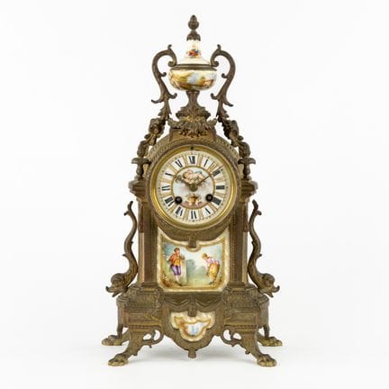 Reloj de sobremesa de bronce con placas de porcela