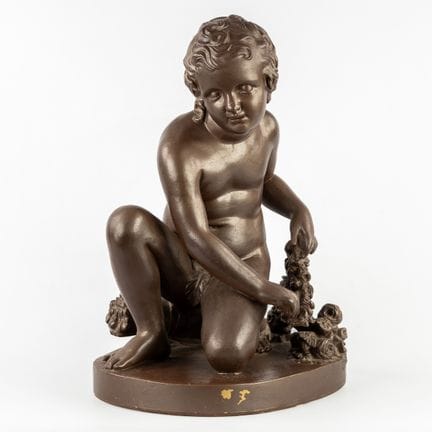 Cupidon, sculpture en terre cuite patinée.



Terr