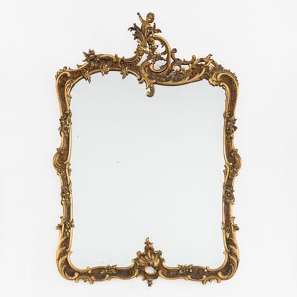 Espejo antiguo con putto, de madera dorada y talla