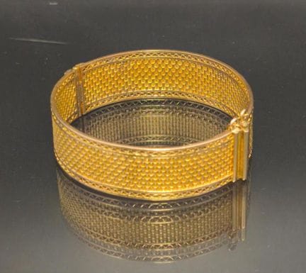 Bracelet manchette ouvrant en or jaune 750 millièm