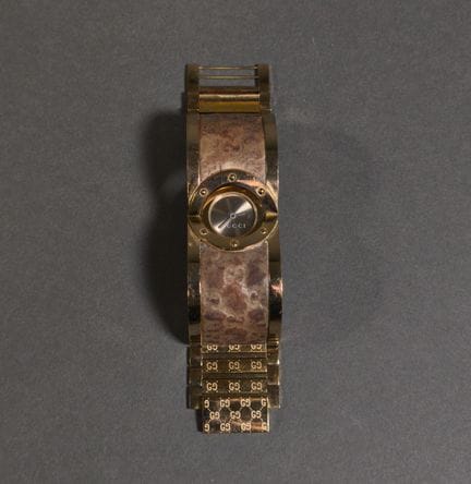 Gucci, montre bracelet Twirl en acier, acier doré,
