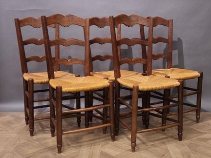 Set di cinque sedie in legno con seduta imbottita 