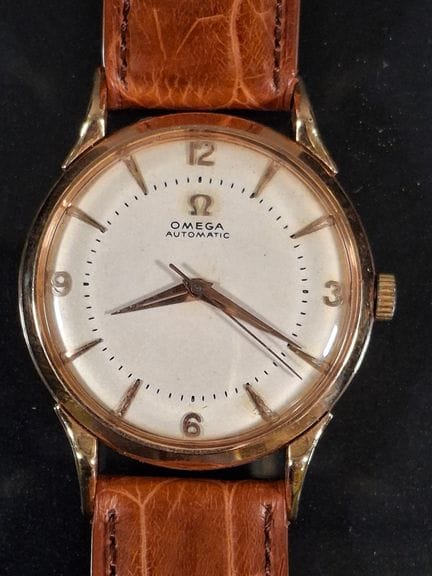Omega, montre bracelet d’homme, boîtier rond en or