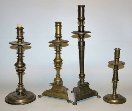4 brass candlesticks, 17th-19th centuries.
Brass, 