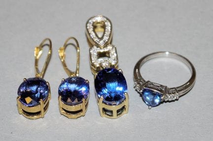 Three-piece jewellery set featuring tanzanite, bri