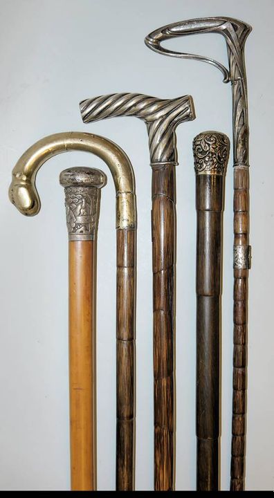 Five collectable walking sticks with silver handle