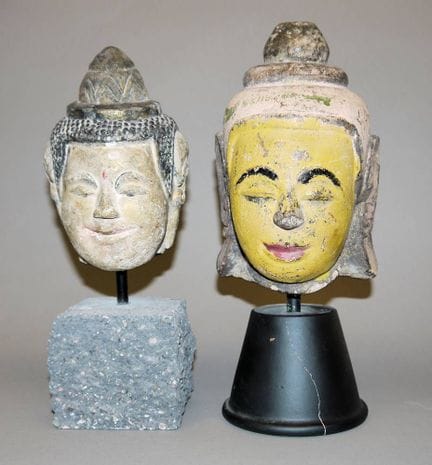 Deux têtes de Bouddha en pierre, Birmanie, XVIIe/X