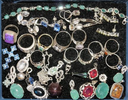 Collection of silver jewellery set with gemstones,