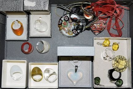 Collection of glass jewellery by Lalique, Murano e