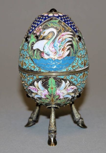 Russian cloisonné egg with cabochons and a swan mo