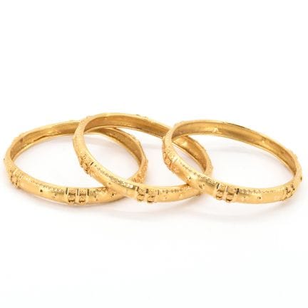 3 pulseras rígidas de oro amarillo de 18 quilates 