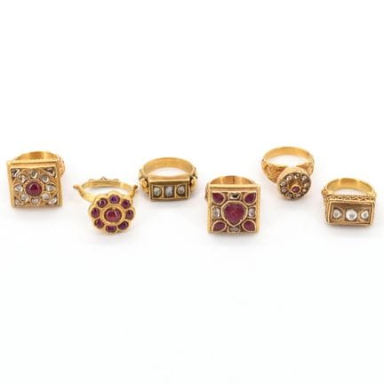 6 anillos de oro amarillo de 18 quilates engastado