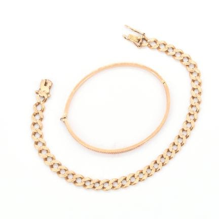 Pulsera y brazalete rígido de oro amarillo de 18 q