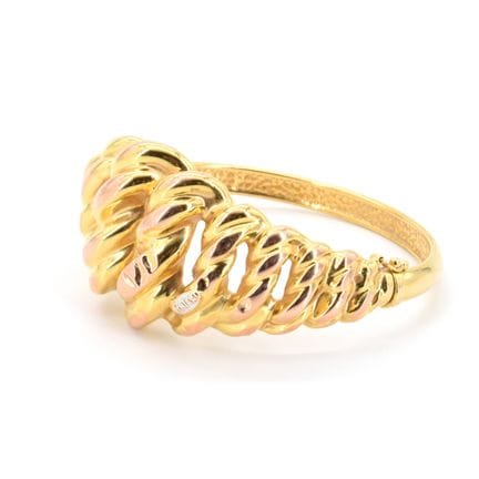 Pulsera rígida de oro amarillo y blanco de 18 quil
