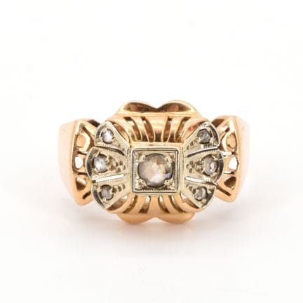 Anillo de oro amarillo y blanco de 18 quilates con