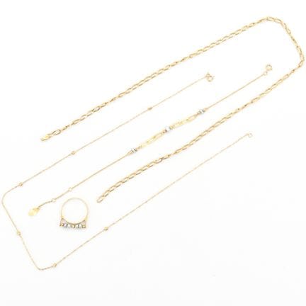 Anillo, 2 collares y una pulsera de oro amarillo d
