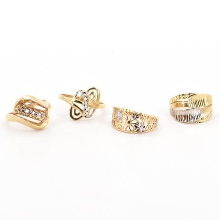4 anillos de oro amarillo y blanco de 14 quilates 