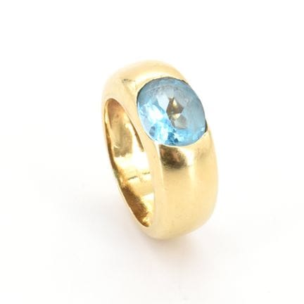 Anillo de oro amarillo de 18 quilates con 1 topaci