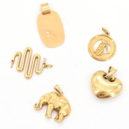 5 pendentifs en or jaune 18 ct serti d'1 brillant 