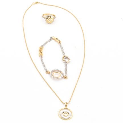 Bague, collier, pendentif et bracelet en or jaune 