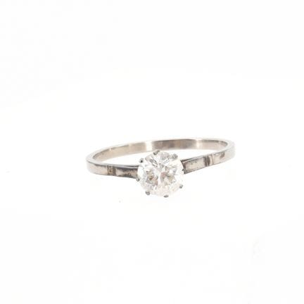 Bague en métal sertie d' 1 brillant +/- 0.80 ct (p
