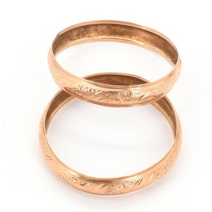 2 bracelets rigides en or jaune 18 ct (soudures, b