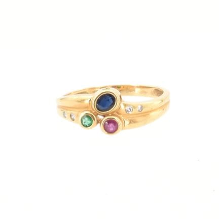 Bague en or jaune 18 ct sertie de 4 diamants taill