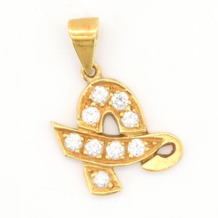 Pendentif en or jaune 18 ct serti de 9 brillants +
