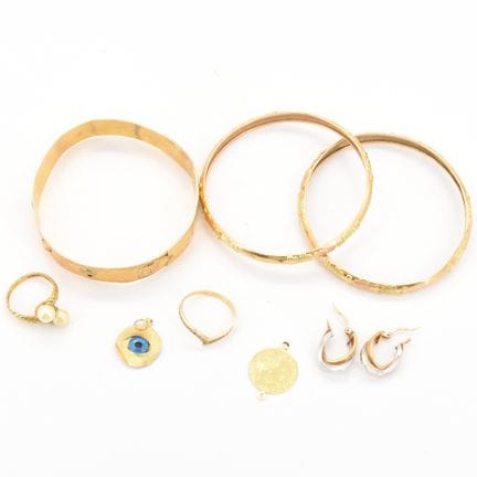 2 bagues, pendentif, 3 bracelets rigides, 2 boucle