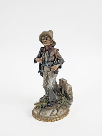 CAPODIMONTE
Sujet en porcelaine figurant un homme 