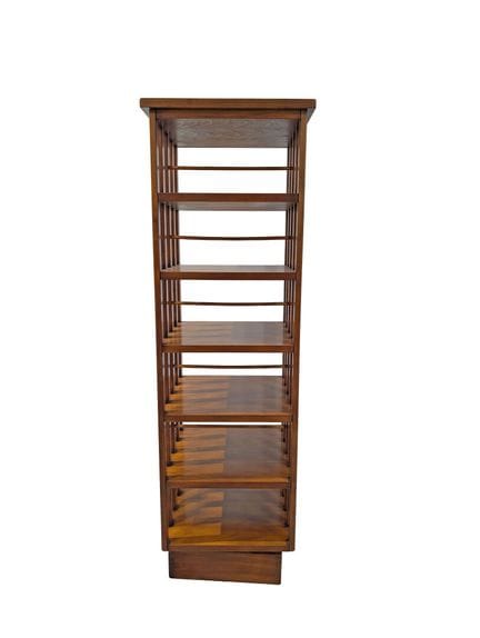 Bibliothèque tournante en bois mouluré
106x32x34 c
