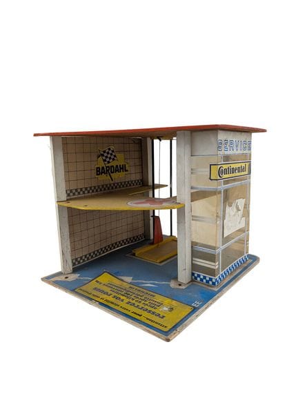 Garage publicitaire 
Usures
24x30x26 cm