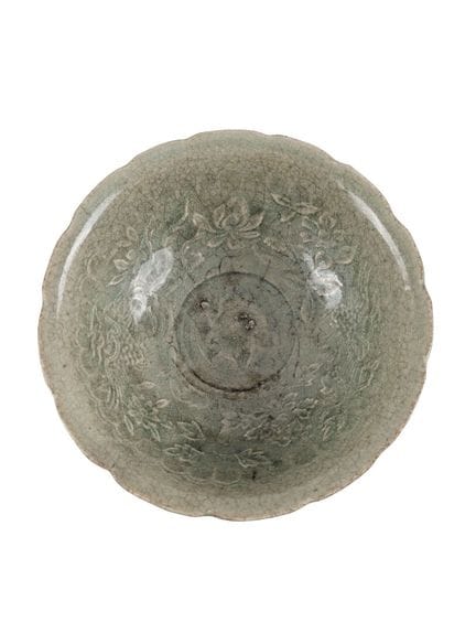 CHINE époque MING
Coupe sur talon 
Usures
16,5x7 c