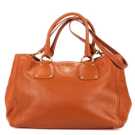 普拉达
橙色“Vitello Daino”小牛皮“Shopping Tote”单肩包。
金色五金件。