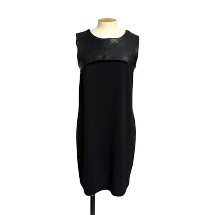 COS
Vestido sin mangas con calado en la espalda, c
