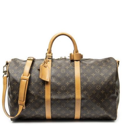 路易威登
“Keepall Bandoulière”单肩包，采用棕色“Monogram”涂层帆布与牛