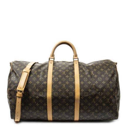 路易威登
“Keepall Bandoulière”单肩包，采用棕色“Monogram”涂层帆布与牛