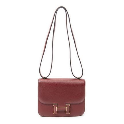 Hermès
Umhängetasche „Constance“ aus granatrotem „