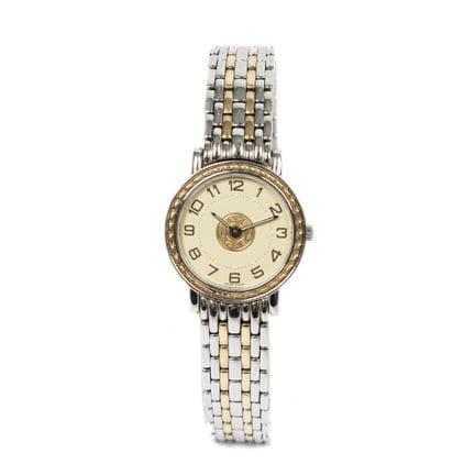 Hermès
Montre « Sellier » en acier argenté et lune