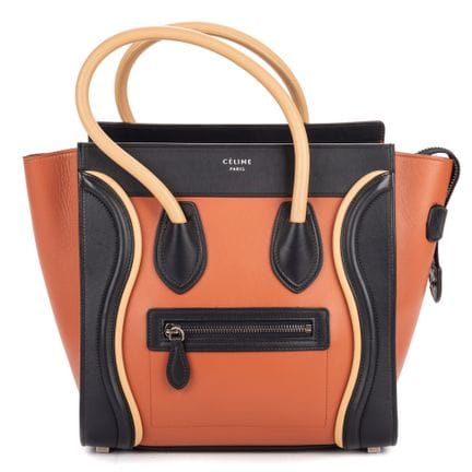 Celine
“Micro Luggage”单肩包，采用橙棕色、海军蓝和米色小牛皮制成。
银色五金件