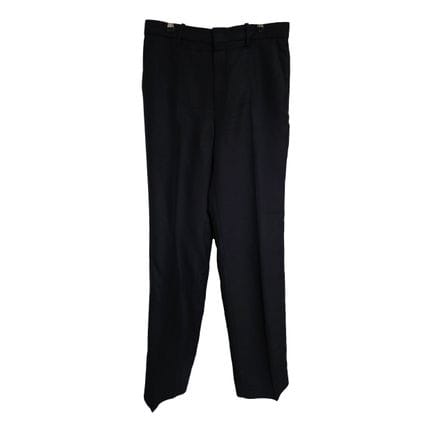 Gucci
Pantalon en soie, laine et viscose noir.
Fer