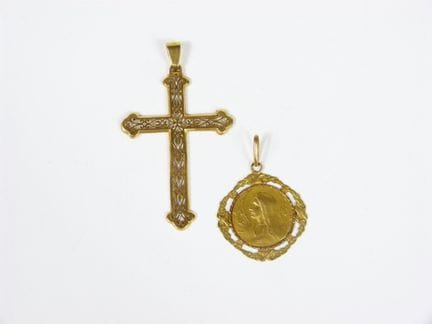 COLGANTE en forma de cruz de oro amarillo de 750‰,