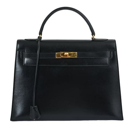 SAC À BANDOULIÈRE HERMÈS KELLY 32 VINTAGE
1976. Cu