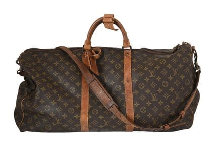 路易威登 KEEPALL 60 旅行包
Monogram 帆布。镀金五金件。肩带。60×30×30 