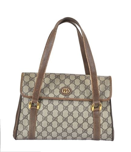 SAC À BANDOULIÈRE VINTAGE GUCCI
Toile Guccissima. 
