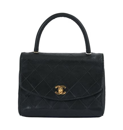 SAC À MAIN VINTAGE CHANEL KELLY À POIGNÉES
Cuir d'